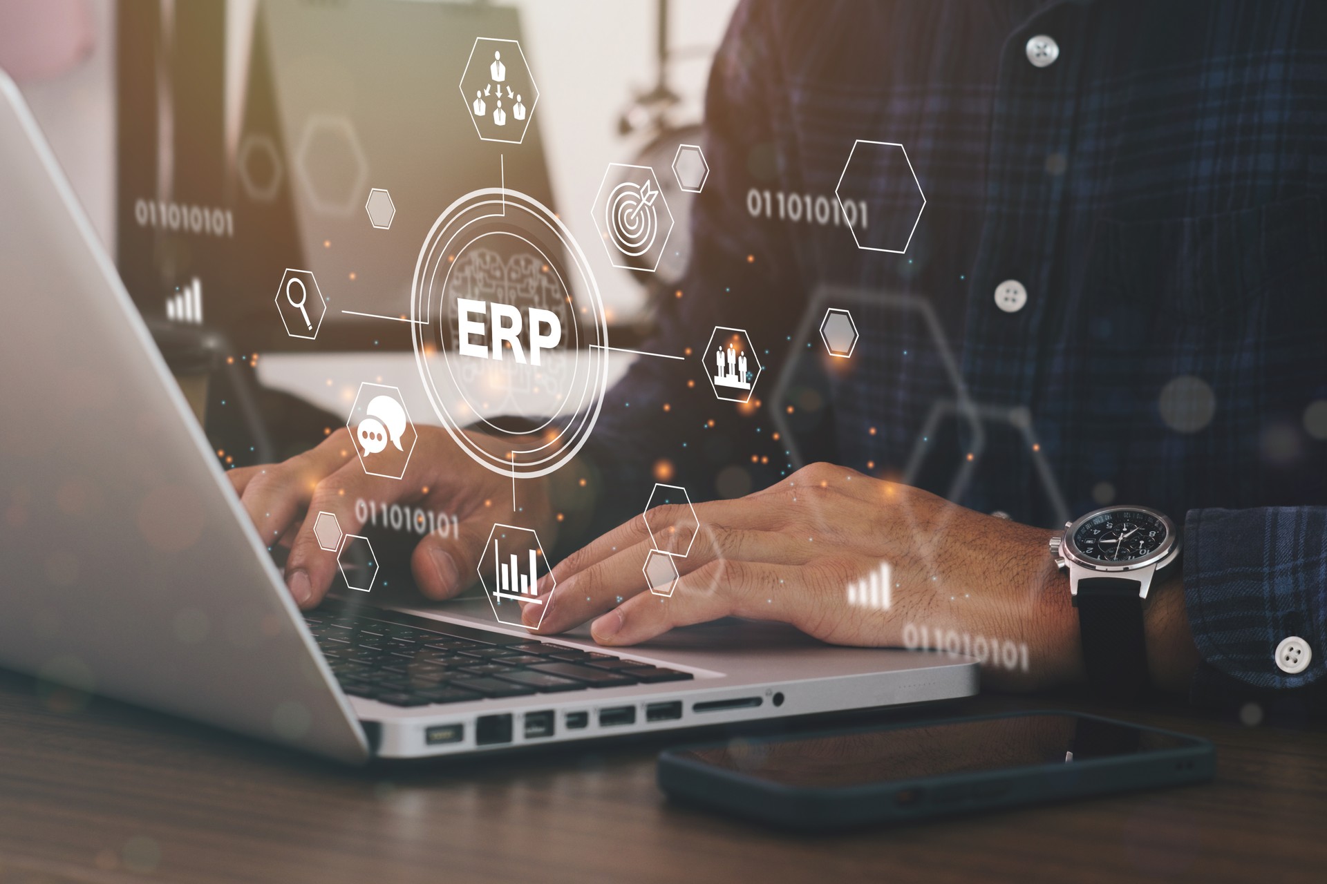 Businessman using a computer to Enterprise Resource Management ERP software system for business resources plan presented in modern graphic interface showing future technology.